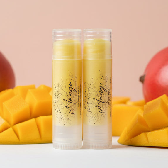 Two lip balm tubes with 'Mango' branding on a textured white background